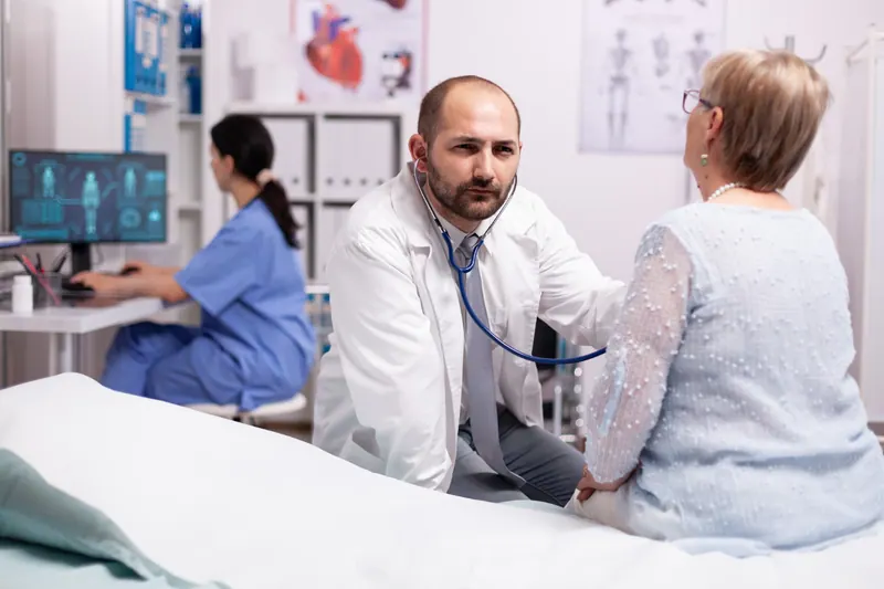 Doctor speaking with a patient during a consultation